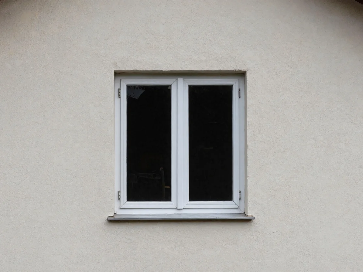 Architectural photograph of a finished aluminum window set flush